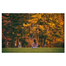 a young woman in meditation pose