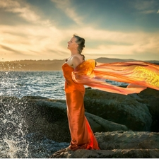 Singer Lorraine Nygaard, Macaulay Point, Fleming Beach Cliffs, Deborah Price photography, jazz music, musicals, Victoria local singer, female songwriter, On The Edge CD Cover photo, orange silk satin gown, organdy, dress made by Lorraine 