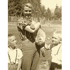 Image: Jean, Lanny, and Larry Lowry with cougar kitten, Date est.1964, Courtesy of the artist.
